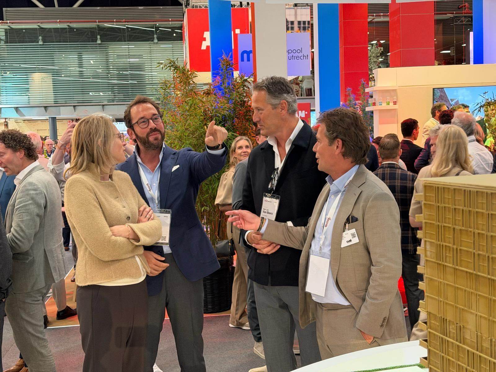 Jeroen Janssen pointing out the plan on the Provada 2026 floor
